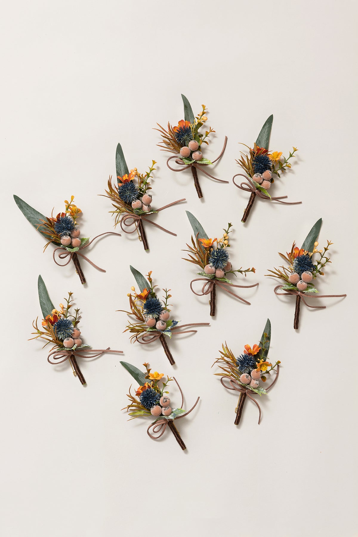 Boutonnieres for Guests in Dark Teal & Burnt Orange