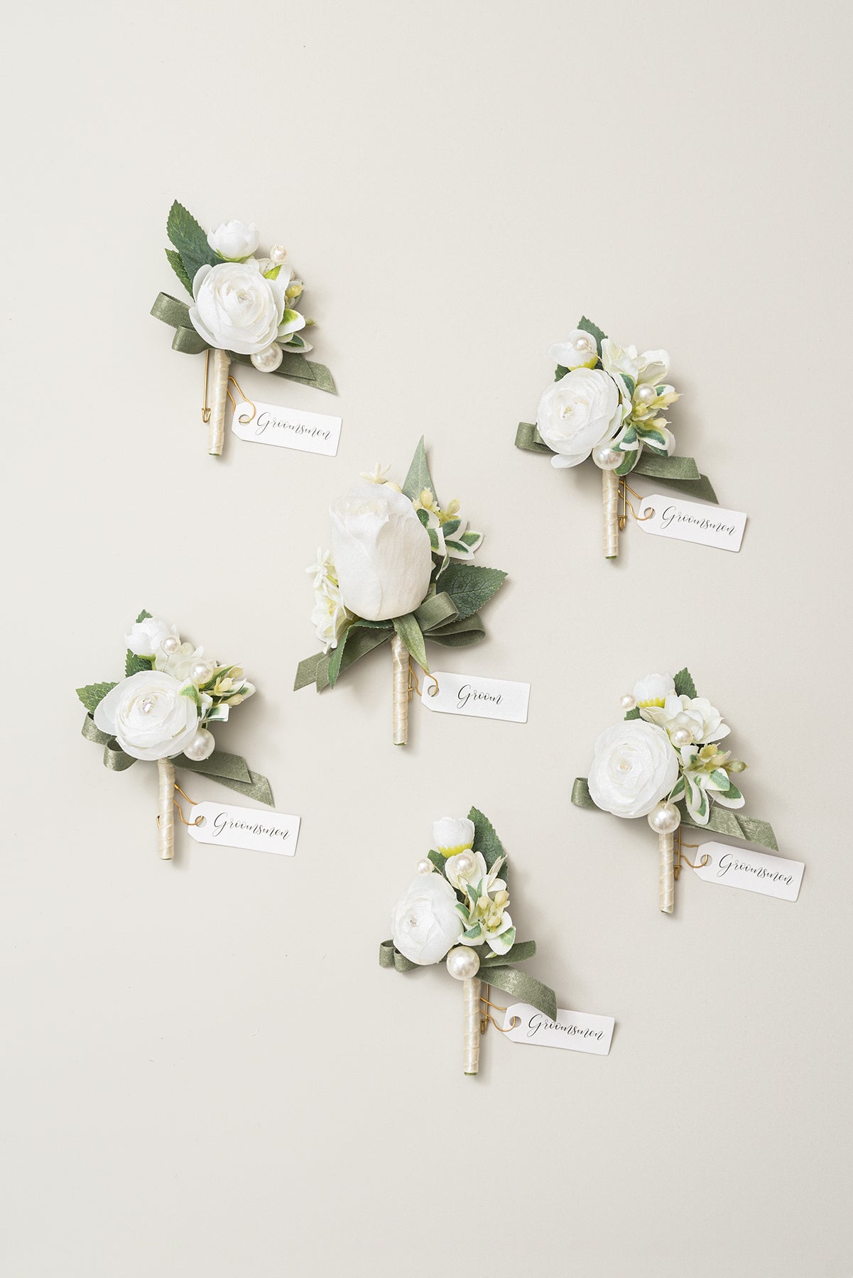Boutonnieres in White & Sage