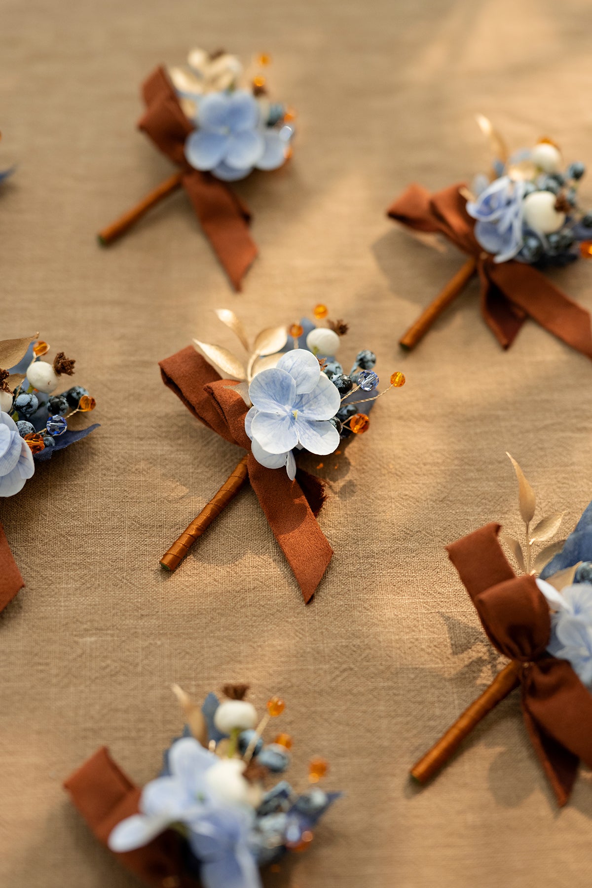 Boutonnieres for Guests in Russet Orange & Denim Blue