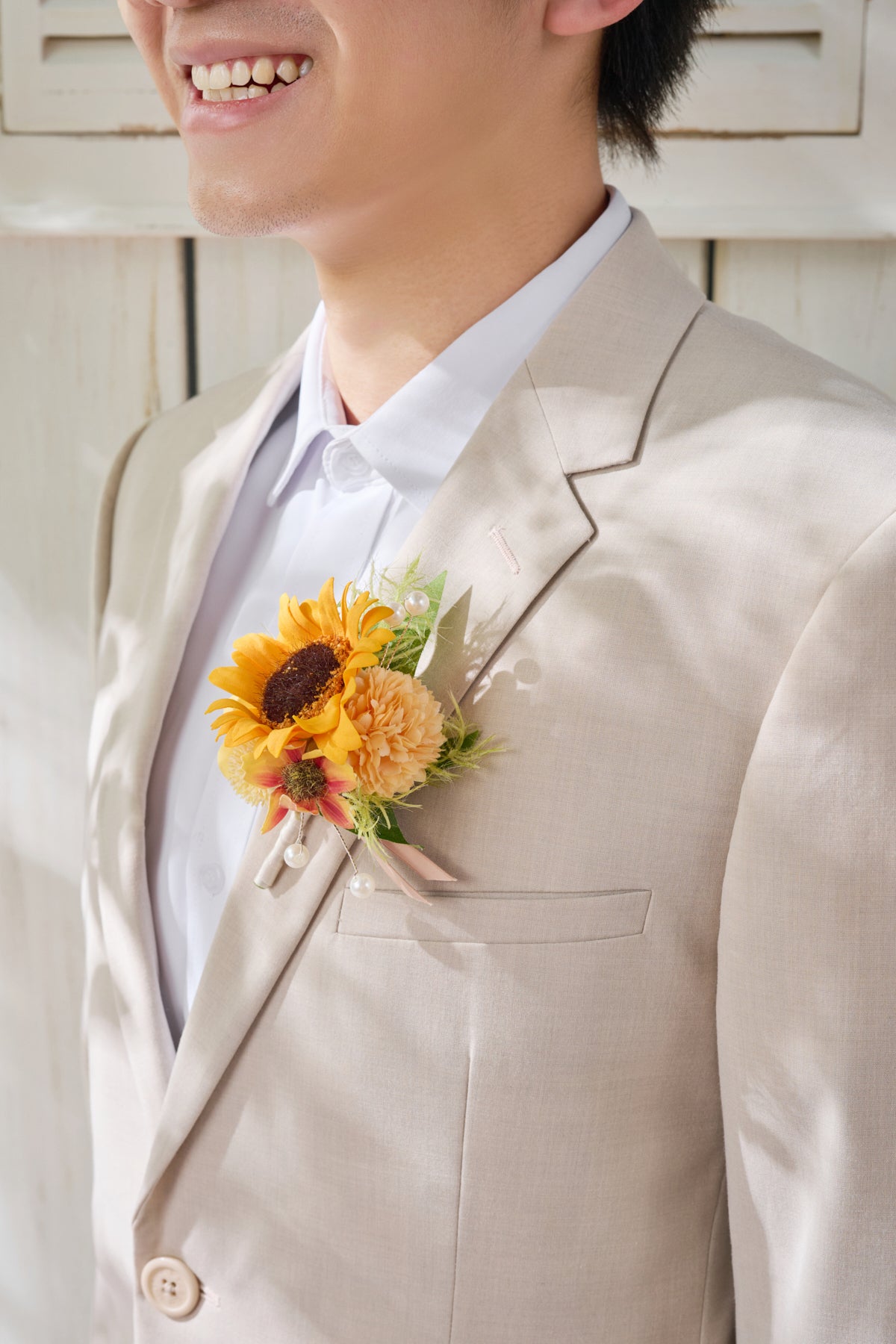 Boutonnieres in Sunflower & Peach