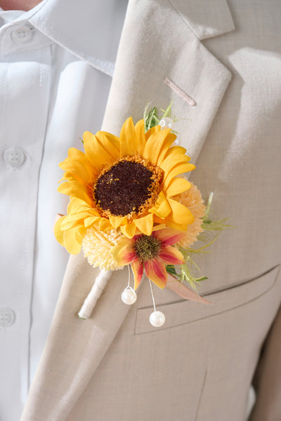 Boutonnieres in Sunflower & Peach