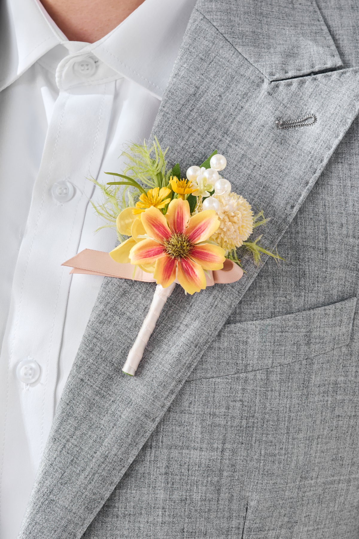 Boutonnieres in Sunflower & Peach