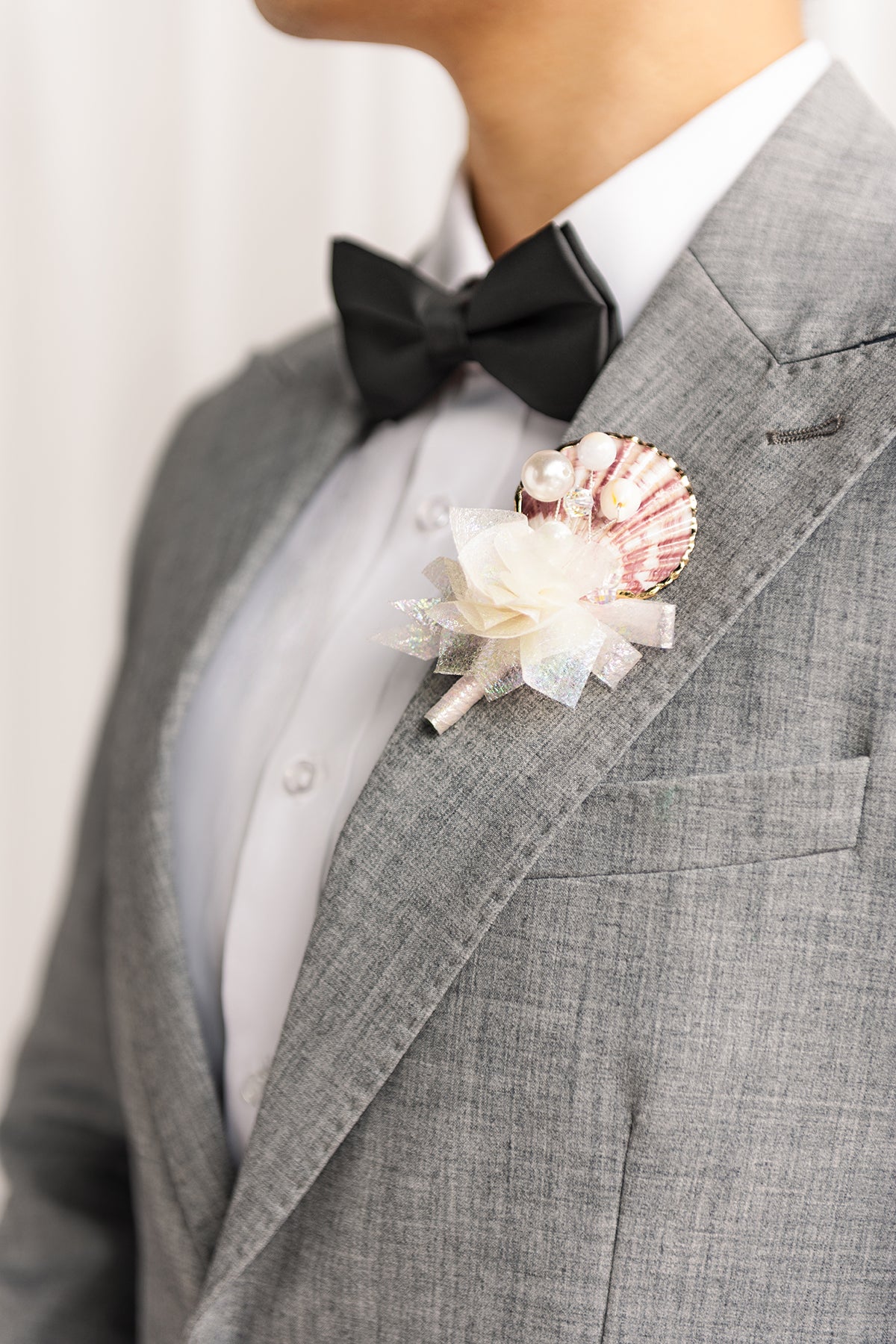 Boutonnieres in Glowing Blush & Pearl