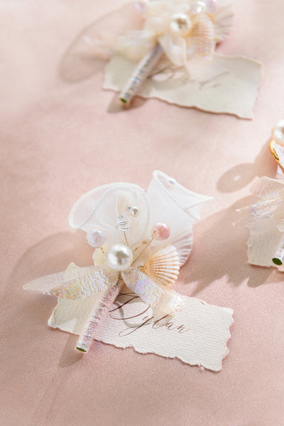 Boutonnieres in Glowing Blush & Pearl