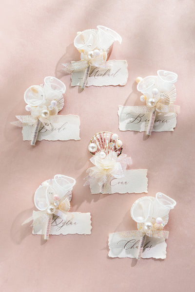 Boutonnieres in Glowing Blush & Pearl