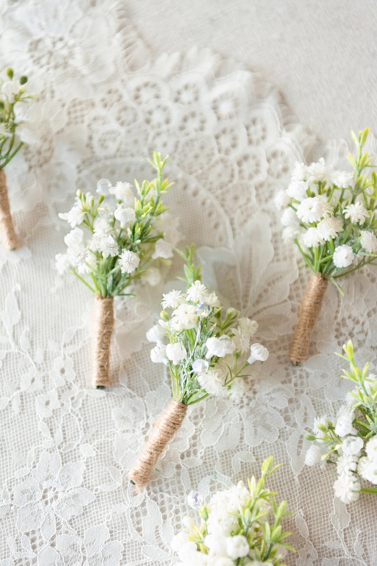 Simply white Babies Breath Boutonniere.