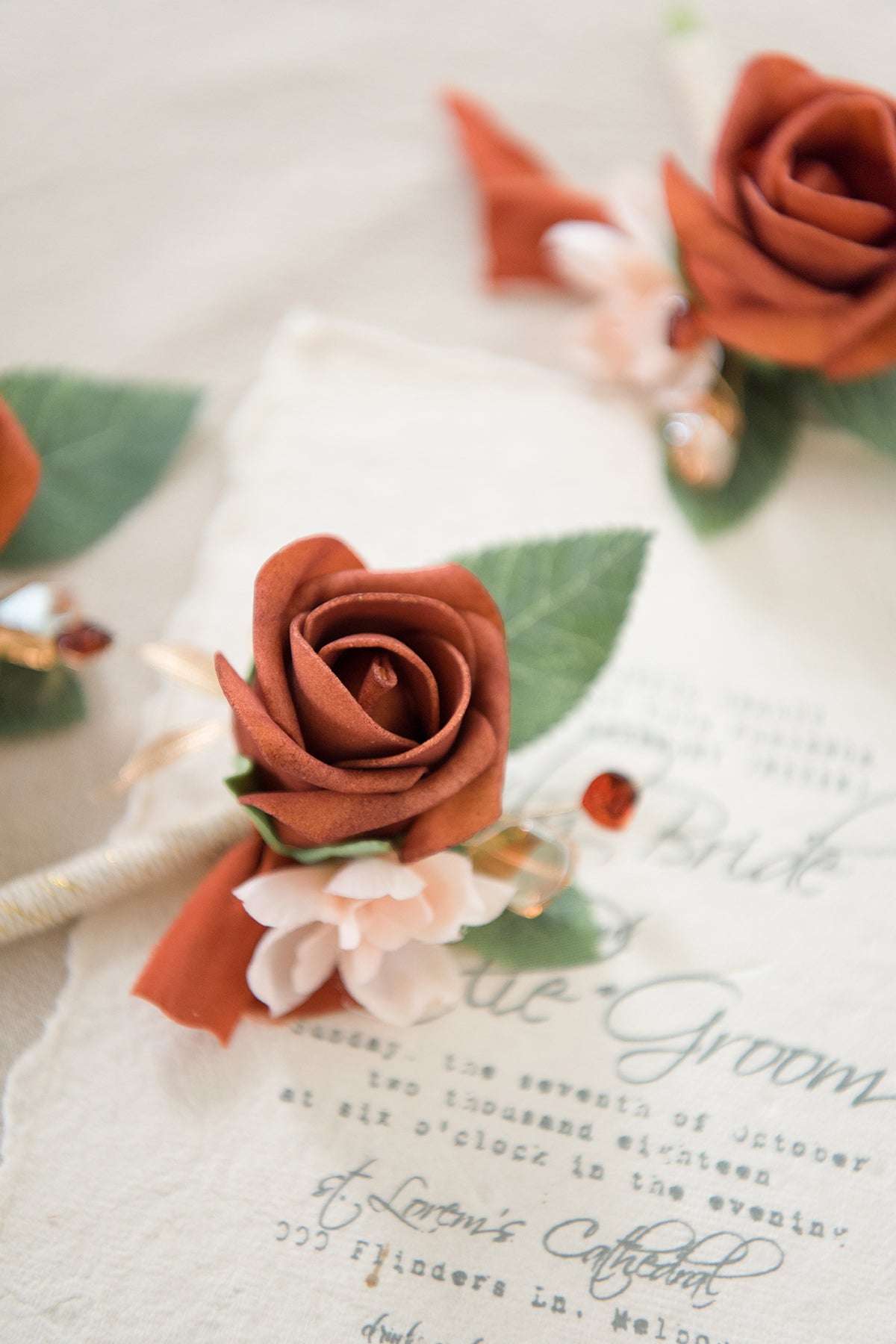 Boutonnieres for Guests in Burnt Orange