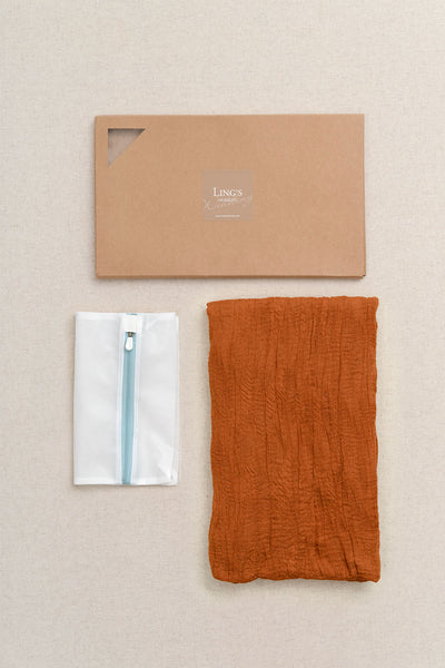 Table linens in Sunset Terracotta