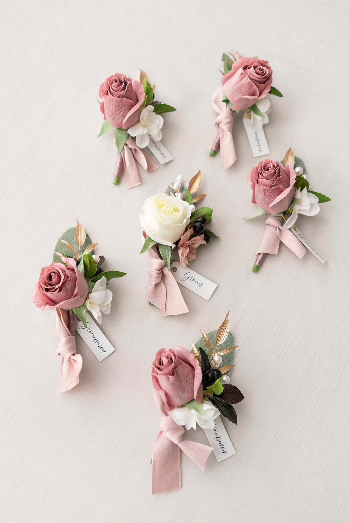Boutonnieres in Dusty Rose & Mauve