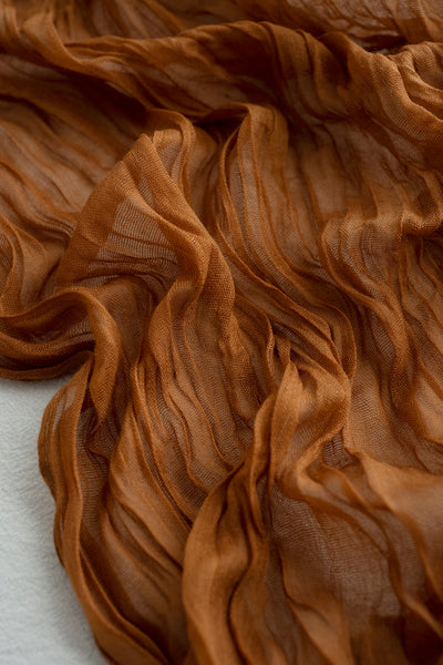Table linens in Sunset Terracotta