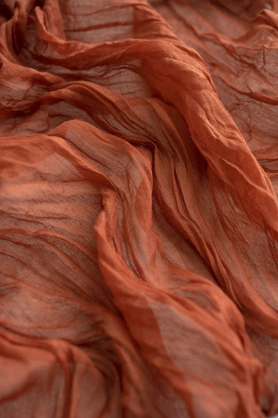 Table linens in Sunset Terracotta