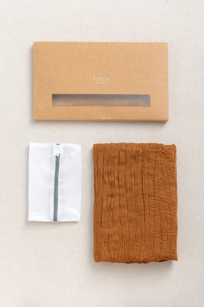Table linens in Sunset Terracotta