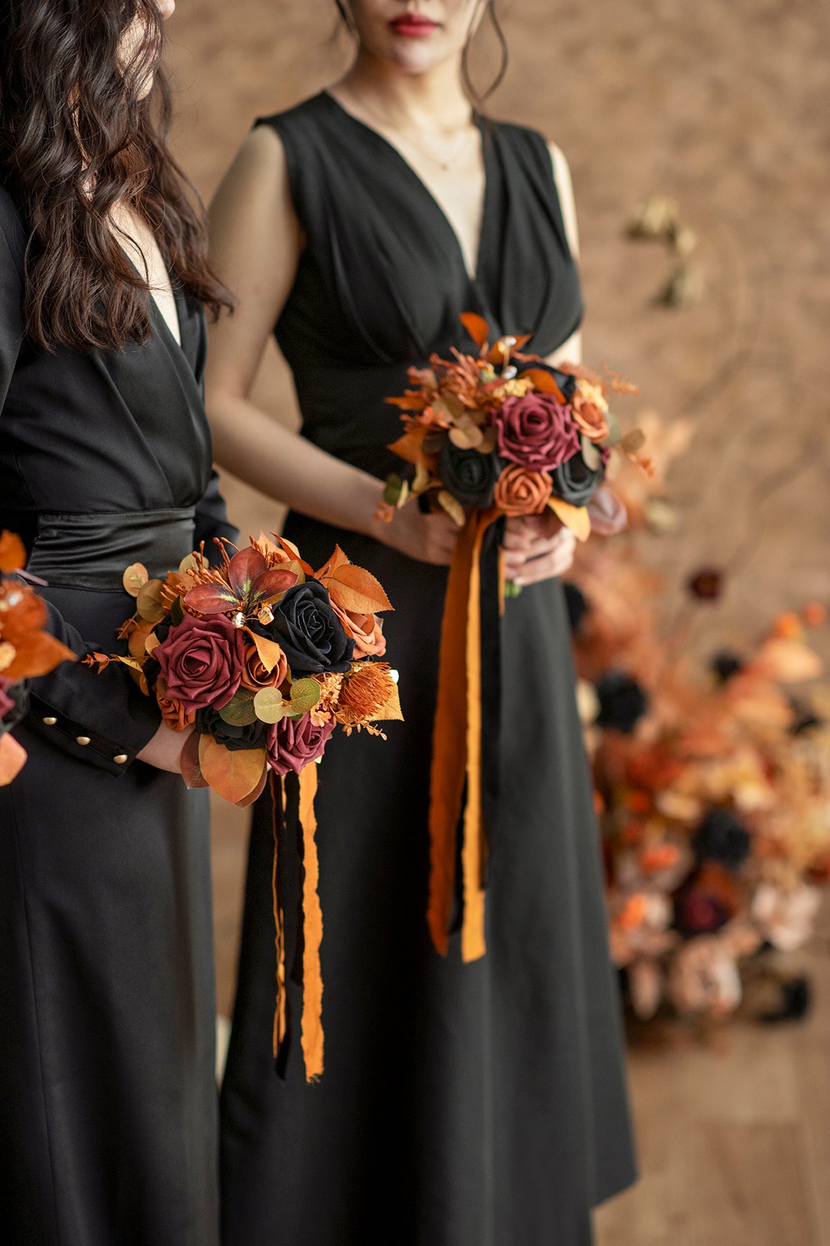 Round Bridesmaid Bouquets in Black & Pumpkin Orange