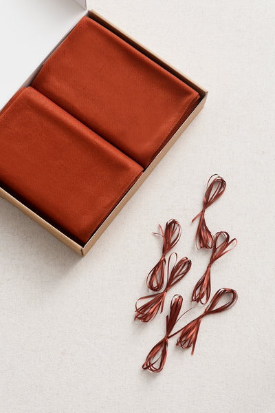 Table linens in Sunset Terracotta